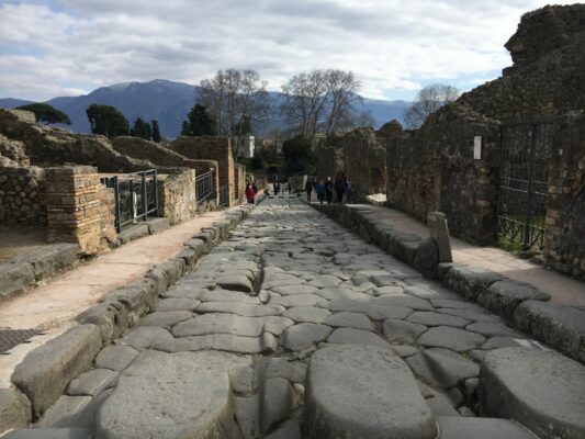 Image of one of the main cobbled streets of Pompeii Archaeological Park