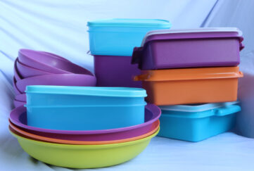 An array of block coloured tupperware boxes and plastic bowls