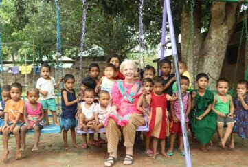 "Pat Mummy" with some of the children from the village Pic: Sreepur Village