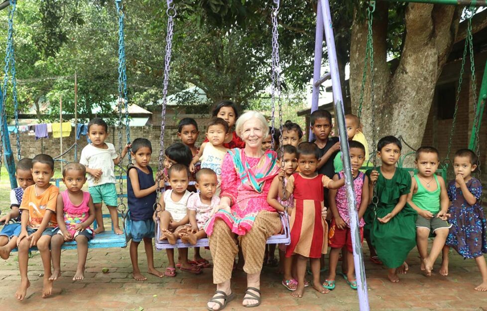 "Pat Mummy" with some of the children from the village Pic: Sreepur Village