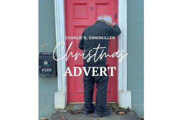 The opening scene from the Charlie's Bar Budget Christmas ad. An elderly man is seen leaving his home with a bunch of flowers. 'Charlie's Enniskillen Christmas Advert'