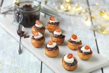 Mini Yorkshire puddings topped with cream cheese