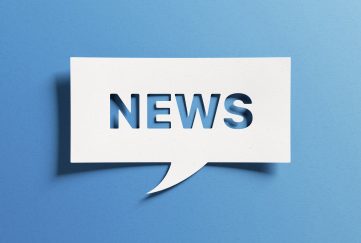 The word 'NEWS' in a white speech bubble, on a blue background.