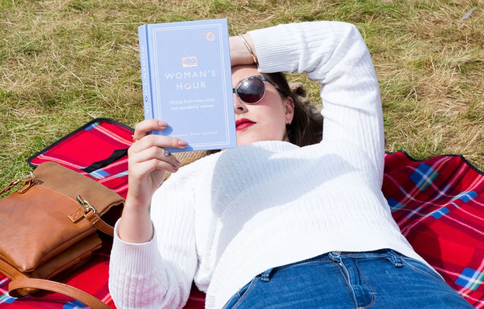 A woman enjoying the sunshine at Hay Book Festival