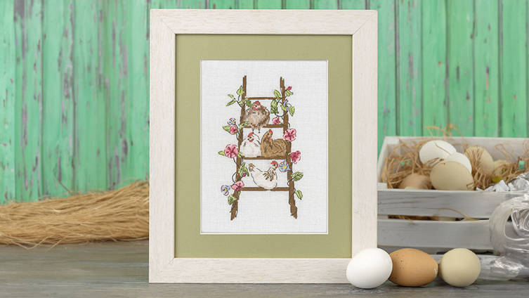 Image of finished The Resident Hens project in a frame with eggs as background.