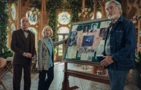 Actors Helen Mirren, Piers Brosnan and Ben Kingsley stand in character in front of an investigation pin board for new film 'The Thursday Murder Club'