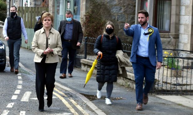 SNP leader Nicola Sturgeon and Aberdeenshire West candidate, Fergus Mutch, campaigning in Insch