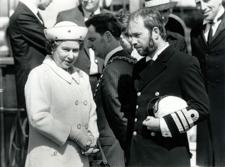 The Queen with John Matthew, the Discovery's "Captain Scott".