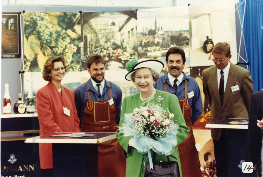 The Queen stops at the Warzburg stand at the Dundee Expo 800 exhibition.