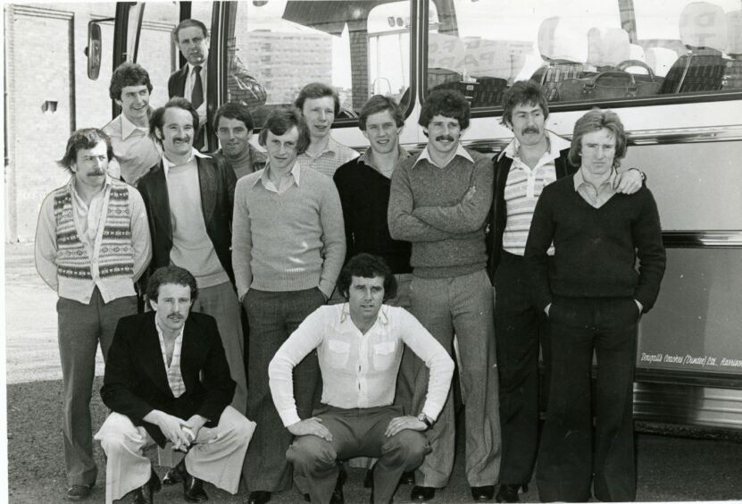 Jim McLean and the Dundee United players before boarding a bus