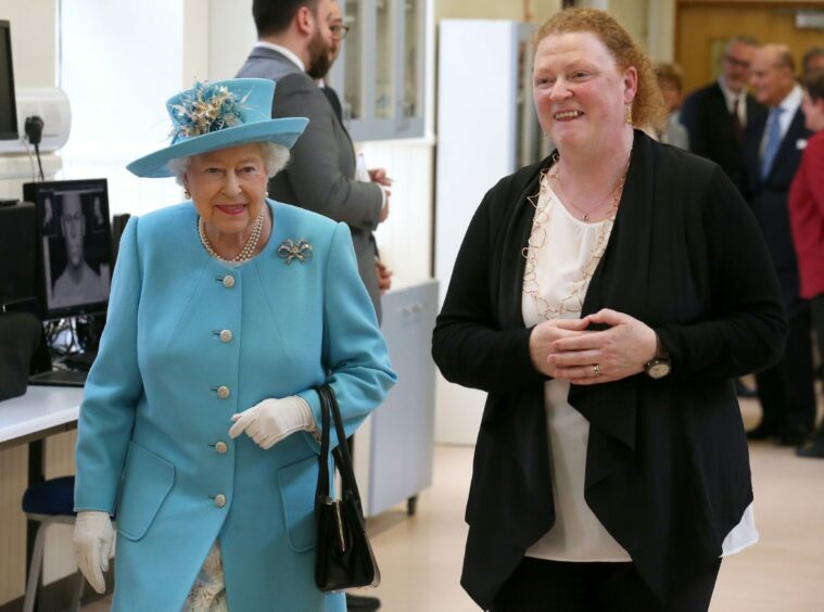 Queen Elizabeth II with Professor Sue Black during a visit to the Leverhulme Research Centre for Forensic Science at Dundee University in 2016.
