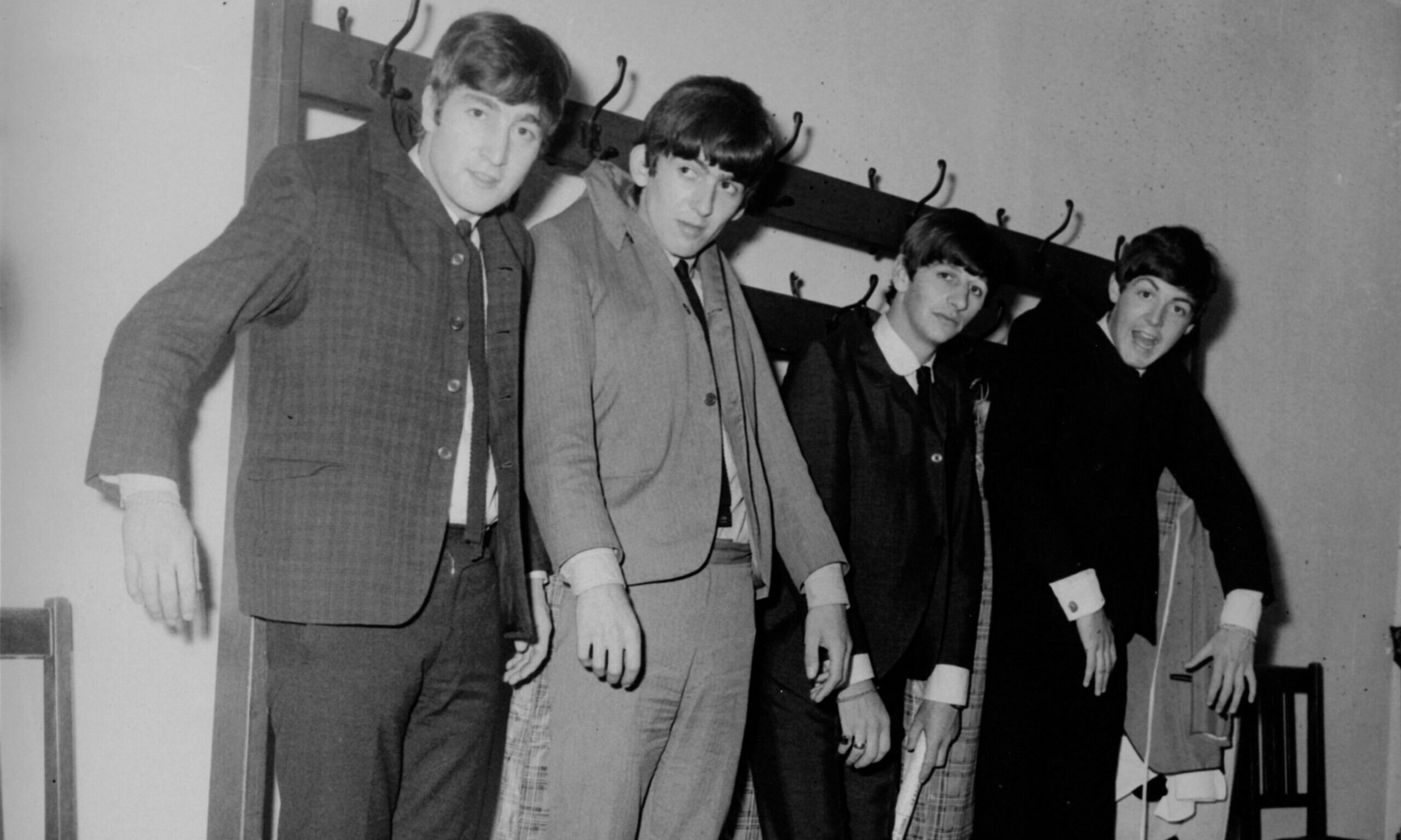 The Beatles hang out backstage at The Caird Hall in Dundee.