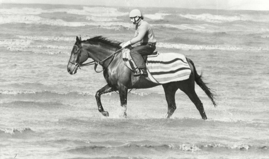Red Rum having a seaside paddle at Southport