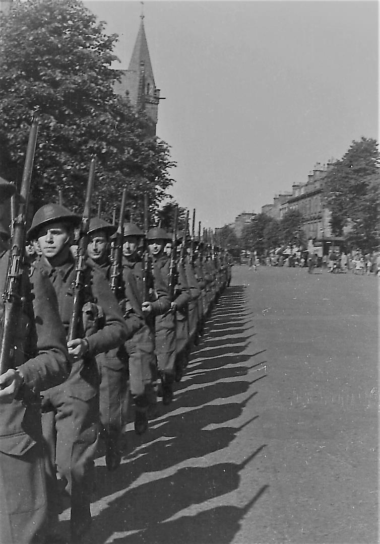 Polish troops march through the centre of St Andrews in one of the images. Picture: Tad Kucharski.