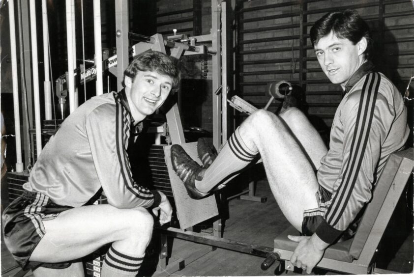 Paul Hegarty and David Narey are pictured after being called up for Scotland duty in 1983. Image: DC Thomson.