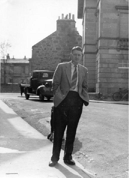Harry MacLeod Robertson standing next to the Park Cafe  in North College Street, Elgin, where he performed musicals and piano recitals to a packed house before relocating to London and becoming bandleader for Lord Rockingham's XI.  c 1956. scotbeat.wordpress.com
