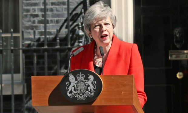 Theresa May delivers a speech outside Downing Street.