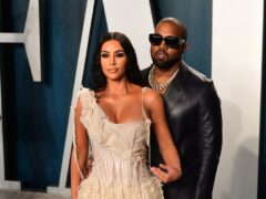 Kim Kardashian and Kanye West attending the Vanity Fair Oscar Party (Ian West/PA)