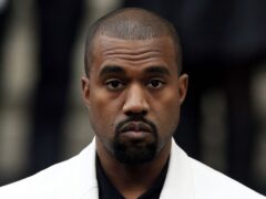 Kanye West apologises for online attacks and use of all capital letters (Jonathan Brady/PA)