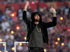 Eminem takes knee in apparent nod to Colin Kaepernick in Super Bowl halftime show (Ted S. Warren/AP)