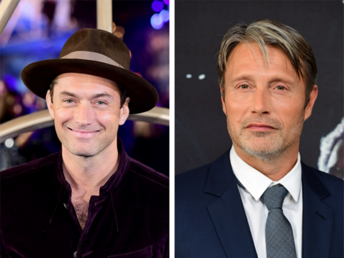 Jude Law and Mads Mikkelsen face off in new Harry Potter spinoff posters (PA Media)