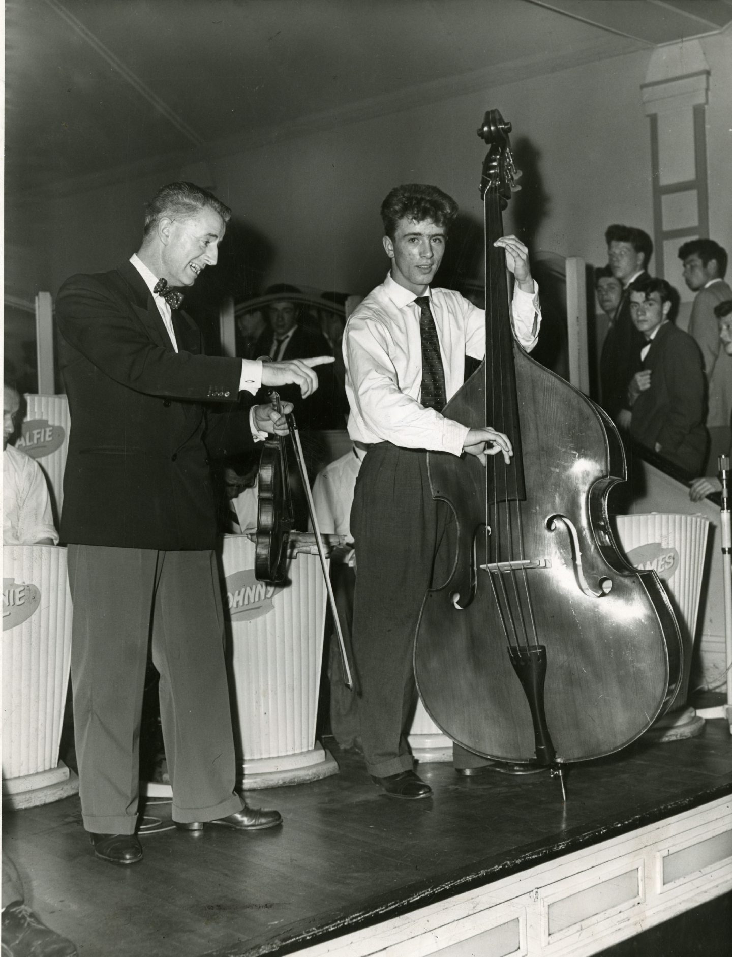Andy Lothian performing alongside his son Andi at the Palais in 1958. Image: DC Thomson.