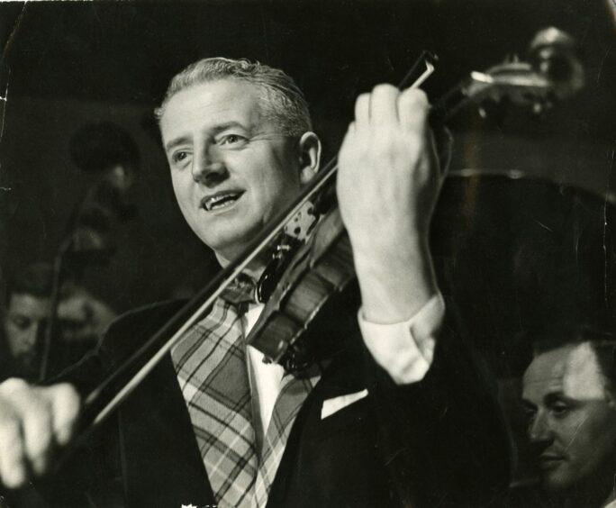 Andy Lothian, pictured playing his violin, provided the soundtrack for several million Dundee dancers. Image: DC Thomson.