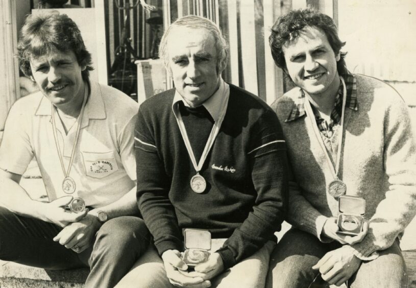 Allard Leblanc, Tom Stewart and Roy Halpin show off their medals following the Grand Slam success in 1983.