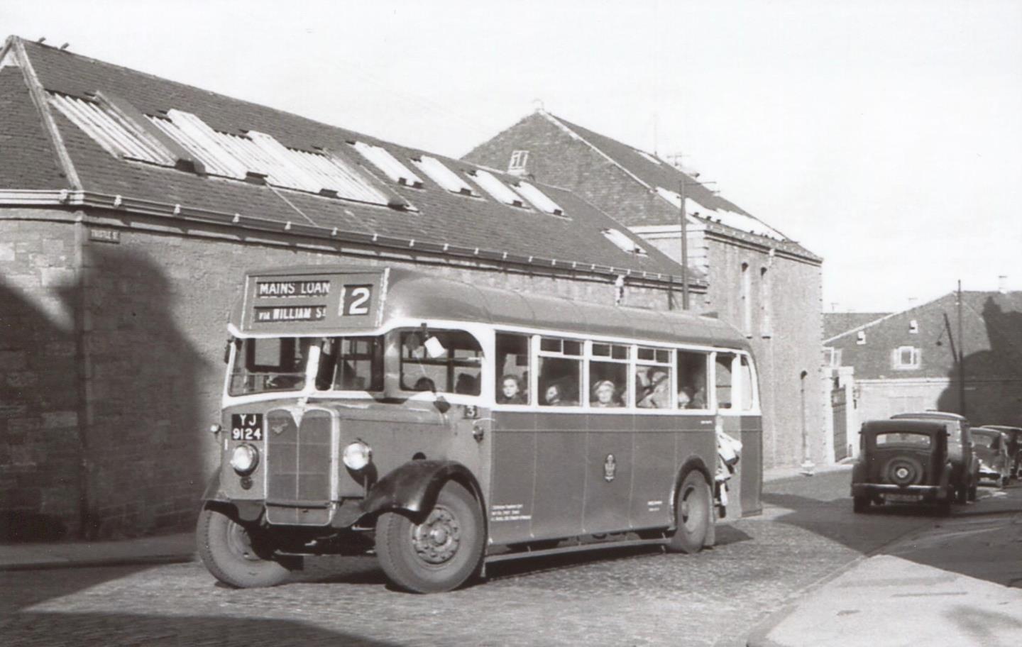 An AEC Regal, new in 1947, exits Thistle Street on service number 2, which went from the city centre to Mains Loan.