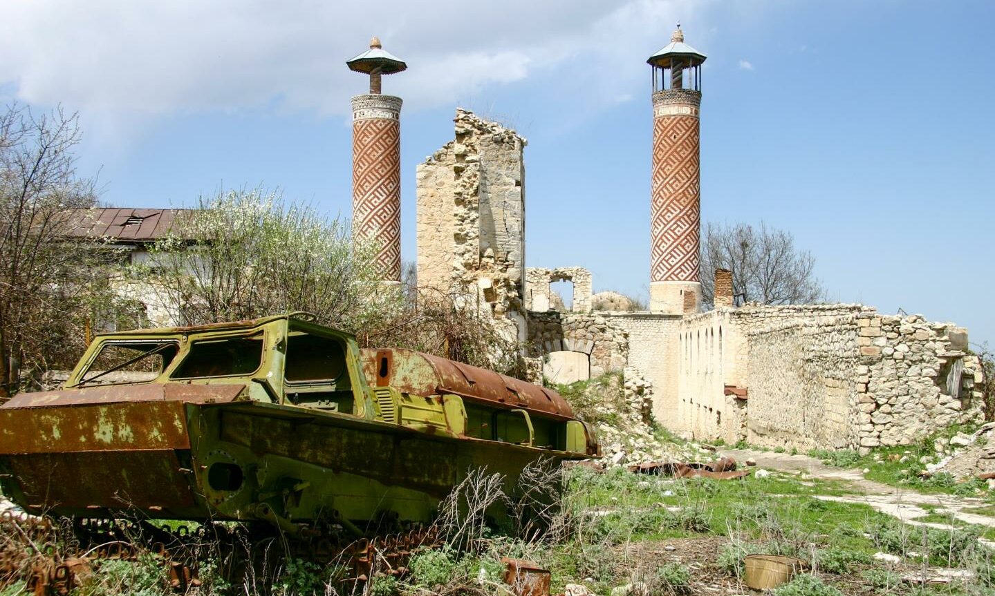 Destroyed armored vehicle, and Ruins of the Azerbaijani part of Shusha.