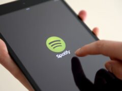 Spotify said the legislation, which ‘criminalises certain types of news’ put its employees and listeners at risk (PA)