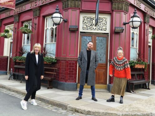Zoe Ball presented the BBC Radio 2 breakfast show from the new set of EastEnders with cast members Danny Dyer and Kellie Bright (BBC/PA)