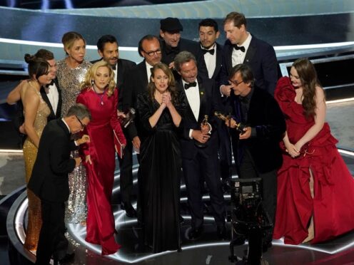The cast and crew of Coda accept the award for best picture at the Oscars (Chris Pizzello/AP)