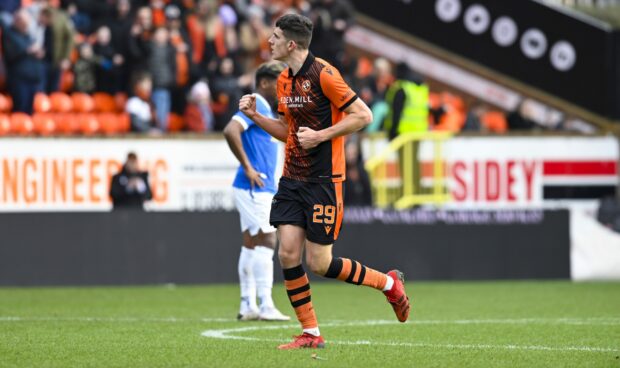 Ross Graham celebrates scoring for Dundee United against Rangers