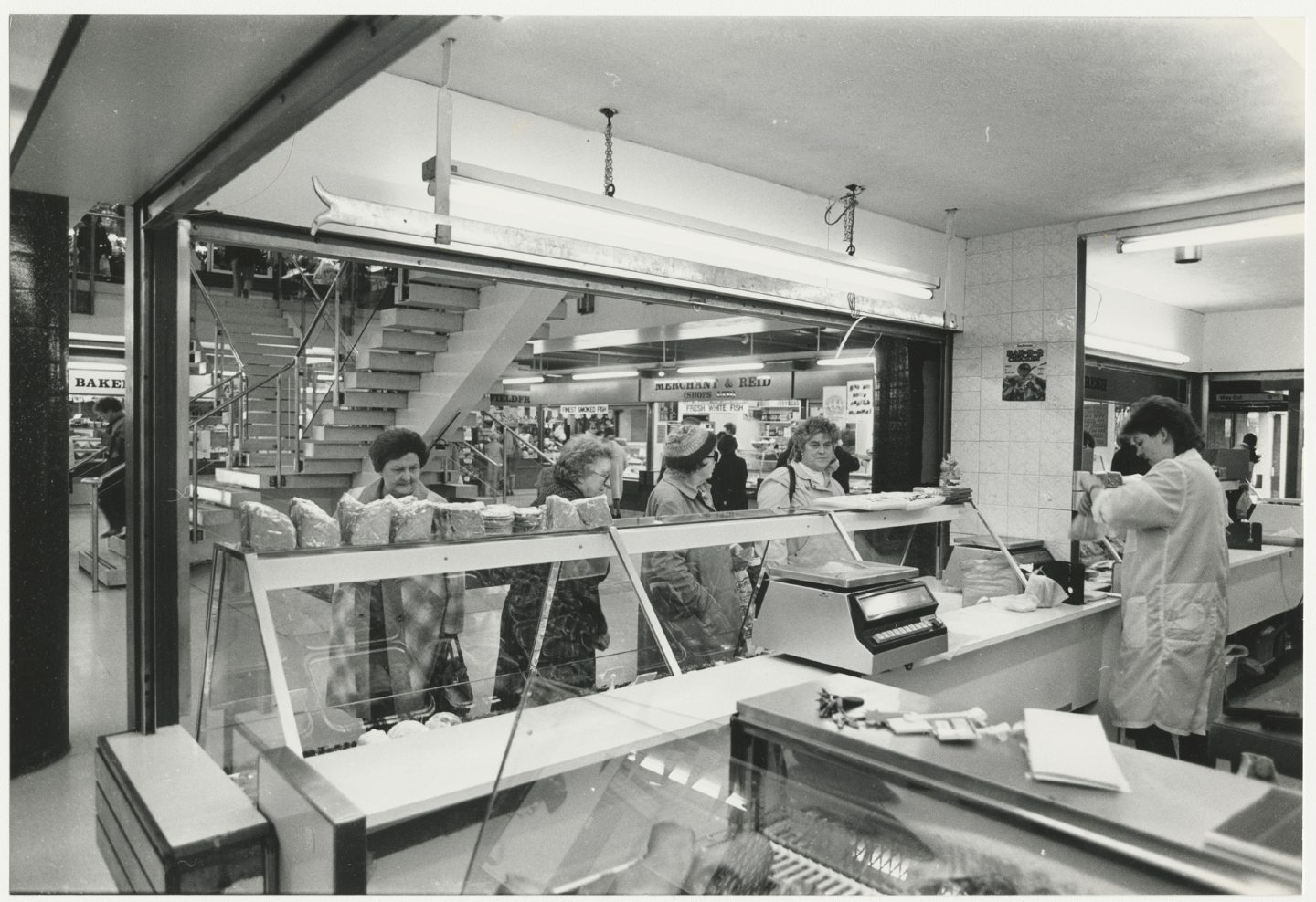 Shoppers line up at the butcher's counter in Aberdeen New Market in 1988.