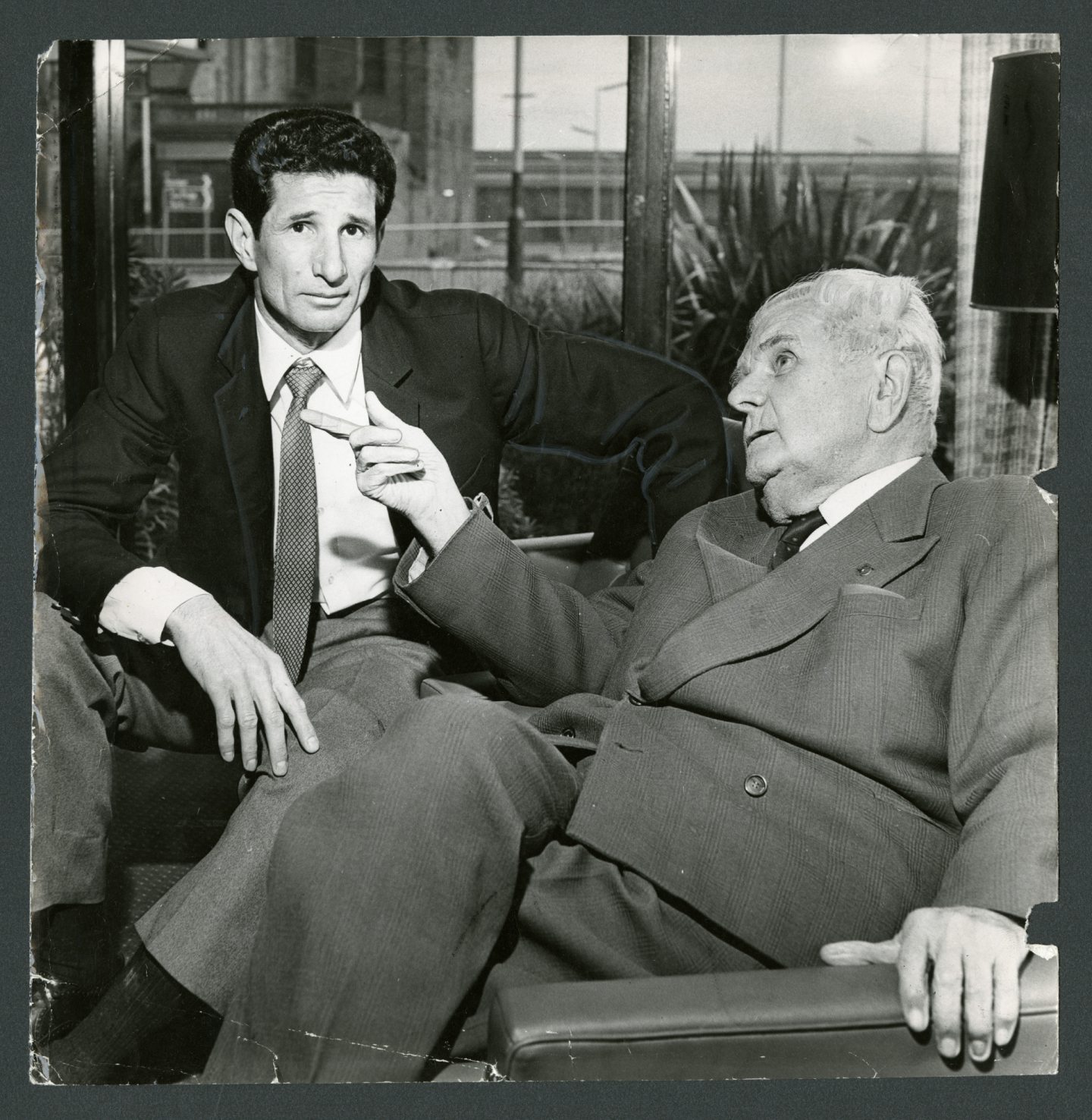 Heriberto Herrera, manager of Juventus, and Victor Pozzo chat in Dundee before the Uefa Cup match at Tannadice.