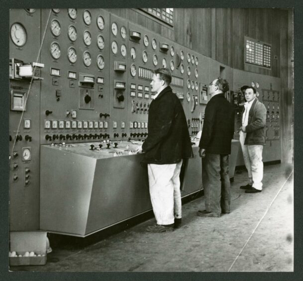 Workers in the B plant after it was connected to the grid in December 1965.