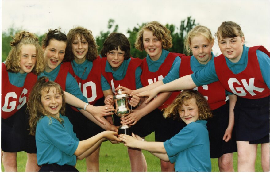 Fintry Primary School's netball team was among the best in the city. This picture shows the girls from the 1991 team displaying another trophy.