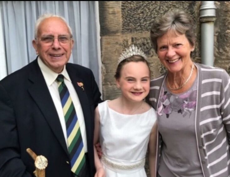 Mr and Mrs Anderson with their granddaughter Alice.