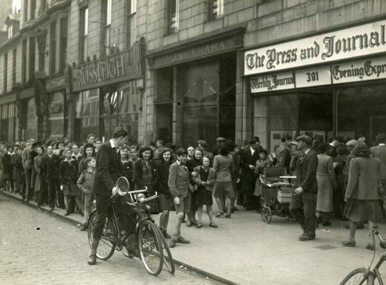 Scores of Aberdeen fans queued for autographs after the club won the Scottish Cup in 1947.