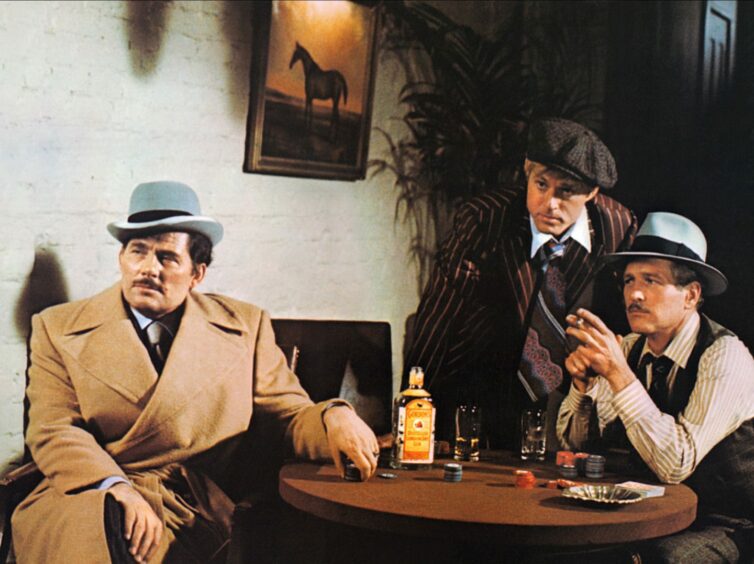 Robert Redford, Paul Newman and Robert Shaw, left, in The Sting.