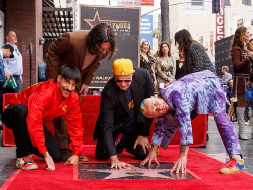 Anthony Kiedis, John Frusciante, Chad Smith and Flea of Red Hot Chili Peppers (Photo by Willy Sanjuan/Invision/AP)