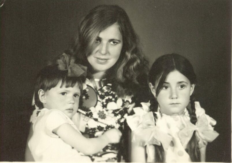 Jolanta, left, as a child, with her sister Daiva and mother Ona.