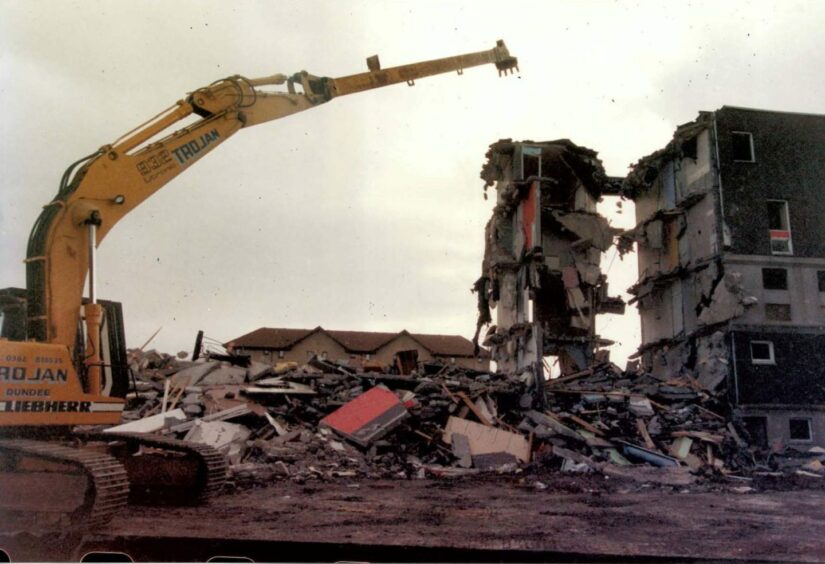 A Skarne block in Ormiston Crescent is demolished by the bulldozers in 1993.