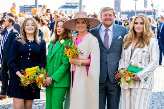 King Willem-Alexander and Queen Maxima with their daughters Princess Amalia, Princess Alexia and Princess Ariane of the Netherlands celebrating the king's 55th birthday during King's Day (Koningsdag) 2022 in Maastricht, The Netherlands. Shutterstock.