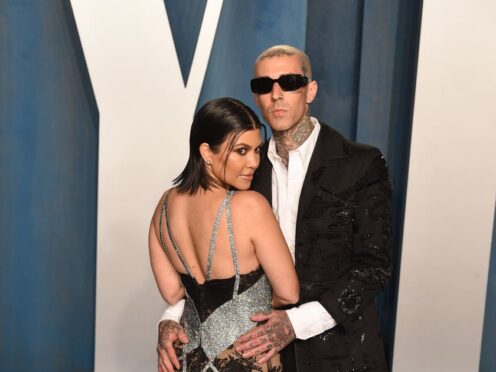 Kourtney Kardashian and Travis Barker attending the Vanity Fair Oscar Party held at the Wallis Annenberg Center for the Performing Arts in Beverly Hills, Los Angeles, California, USA. Picture date: Sunday March 27, 2022. (Doug Peters/PA)