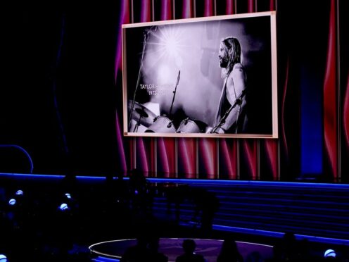 Clips of Taylor Hawkins headlined the in memoriam section of the 64th Annual Grammys as Foo Fighters paid tribute to ‘the best drummer in the world’ (Chris Pizzello/AP)