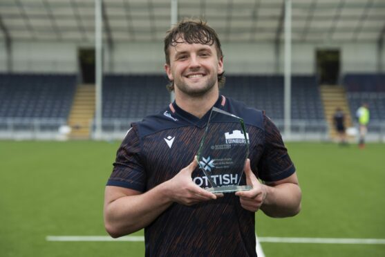 Ben Muncaster with his Scottish Building Society Player of the Month award for March at the DAM Health Stadium in Edinburgh. Paul Devlin / SNS Group.