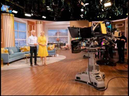 This Morning hosts Phillip Schofield and Holly Willoughby with drone between them and camera (Ken McKay/PA)