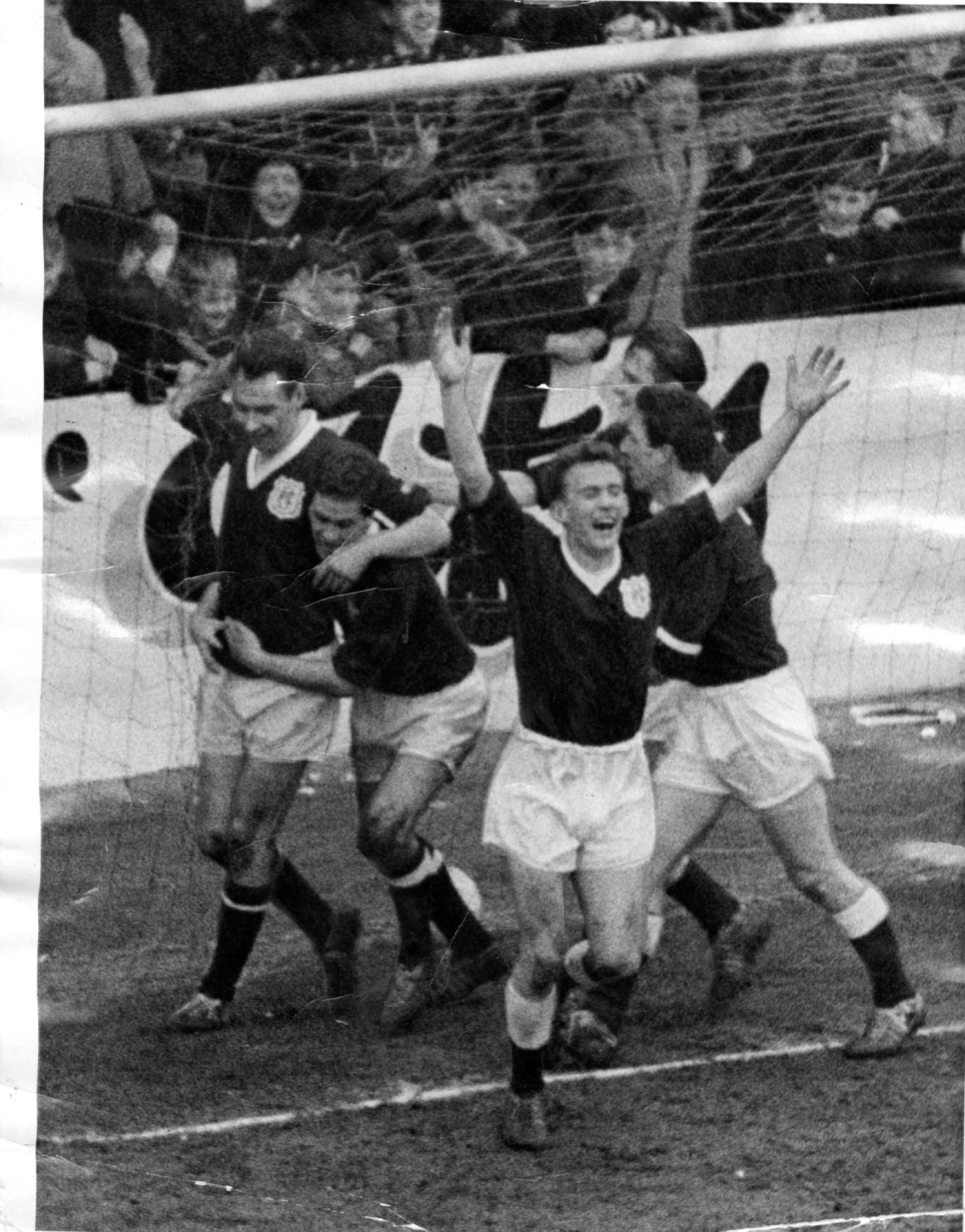 The Dundee players celebrate during the 2-1 victory against city rivals United at Tannadice.